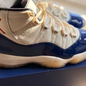 Jordan Retro 11 Patent Leather High-Top Sneakers in White, Royal Blue and Cream